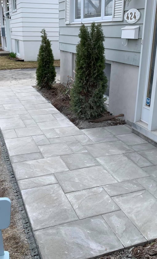 Pose-et-reparation-de-pave-uni-Rive-Nord